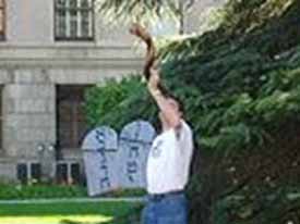 Curtis blows the shofar