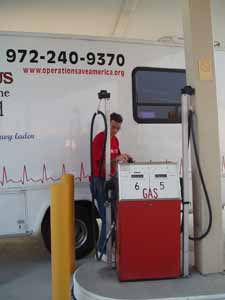 Curtis getting gas when no other stations were open