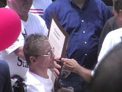 Pastor Stephen Mashburn of Wichita signing the Emancipation Proclamation for the Unborn Children July 16. 2001 with other pastors