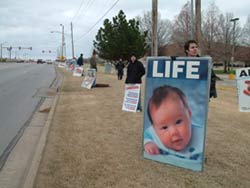 The face of life contrasts the face of abortion