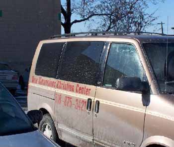Church van in abortion mill parking lot