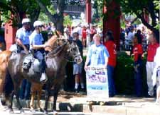 Baby advocate Issac being told that he has no rights on the public sidewalk outside Union Station&nbsp;at the Kerry-Edwards 