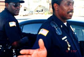 Lang at right with outstreched hand