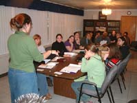 The Sidewalk Counseling trainees listen to the lecture. Click image for larger view