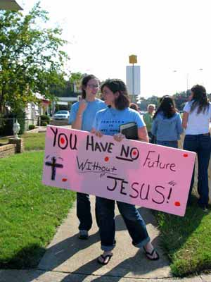 Missi and Rachel prepare to minister to a couple entering the psychic's house.