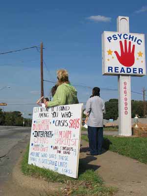 Jackie of Teen Mania holds a very colorful sign