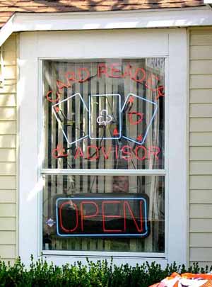 The Psychic's little boy looks out the window.