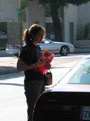 Rachel counsels a woman in her car