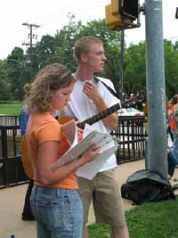 Ryan and Brandi preparing to lead worship - Click image for larger view